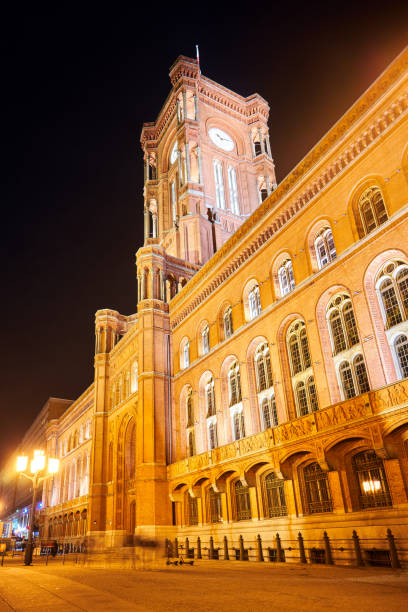 istock Neo-Renaissance Red Town Hall with the clock tower in the night 1237673130