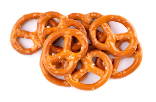 istock Bretzels cracker isolated on white background. Dry cracker cookies isolated. Salty snacks isolated. Top view. 1237716907