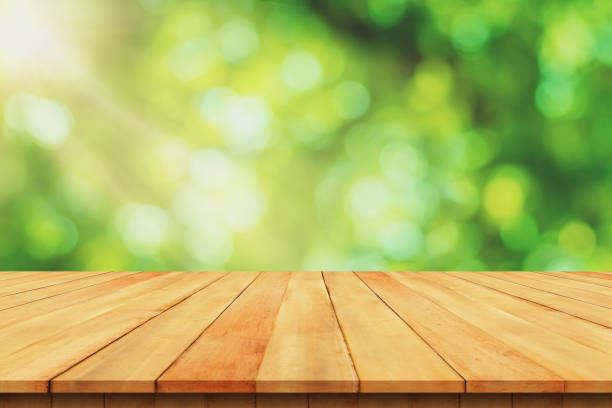istock Wood flooring and sunlight and bokeh from leaves 1237739208