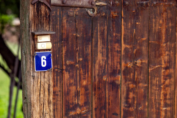 Old, rusty house number plate, old house number, street number