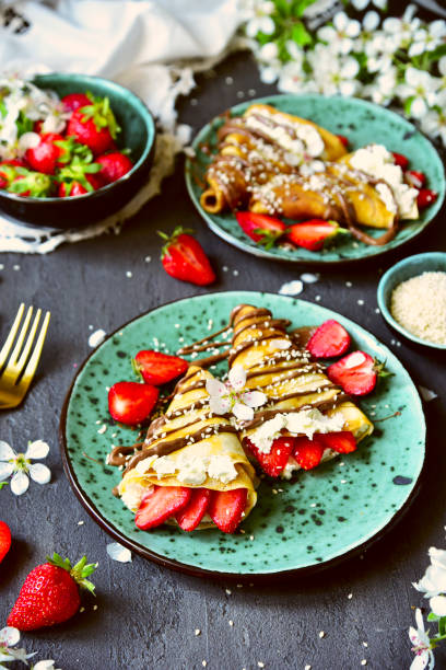 istock Pancakes with strawberries and chocolate. Spring still life with a sweet breakfast. 1237800215