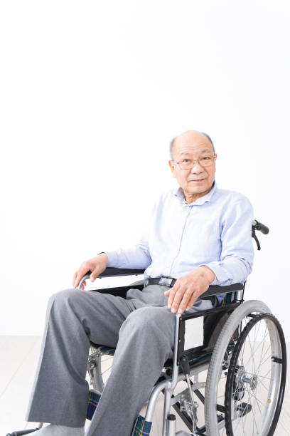 istock Old man ride in a wheelchair 1237814123