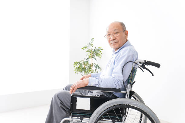 istock Old man ride in a wheelchair 1237814200