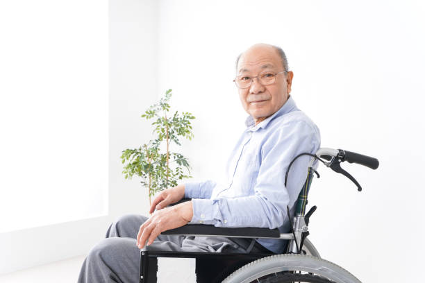 istock Old man ride in a wheelchair 1237814583