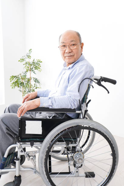 istock Old man ride in a wheelchair 1237814590