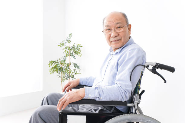 istock Old man ride in a wheelchair 1237814623