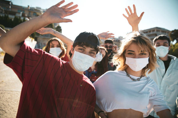 istock Generation Z teens wearing protective face masks 1237829096