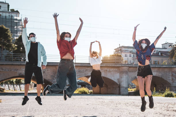 istock Group of generation Z teenager respecting social distancing 1237841652