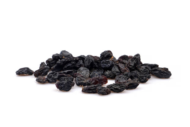 istock Organic Black raisin isolated on white background 1237843260