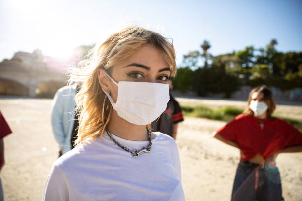 istock Generation Z teens wearing protective face masks 1237857465