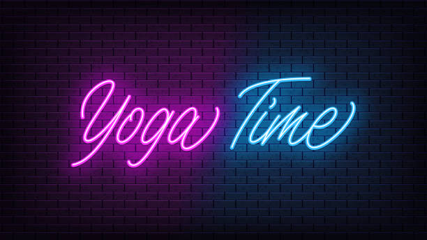 istock Neon Yoga Time, lettering. Neon text of Yoga Time on black brick background 1237886788