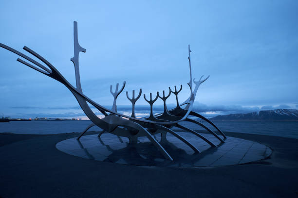 Sun Voyager monument, Iceland REYKJAVIK, ICELAND - APRIL 8, 2016: Solfar or Sun Voyager monument in Reykjavik, Iceland voyager stock pictures, royalty-free photos & images
