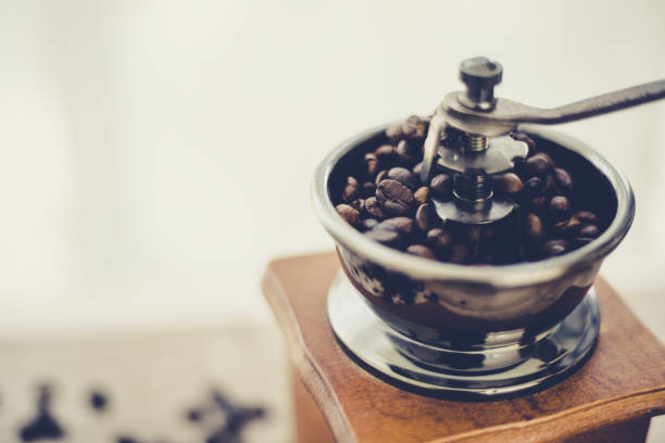 istock Roasted coffee beans in vintage style grinder 1237947401