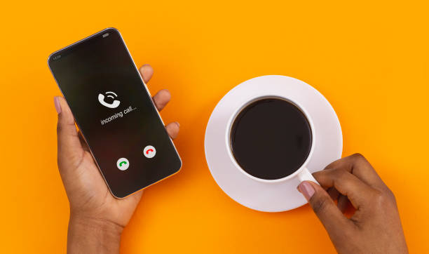 istock Female Hand Holding Phone With Incoming Call 1237966027