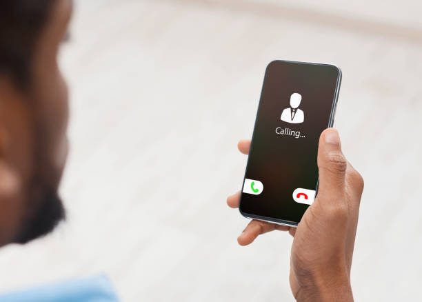 istock Male Hand Holding Phone With Incoming Call 1237966045