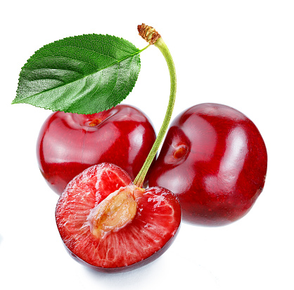 cherry with slice and leaf retouched and isolated white background