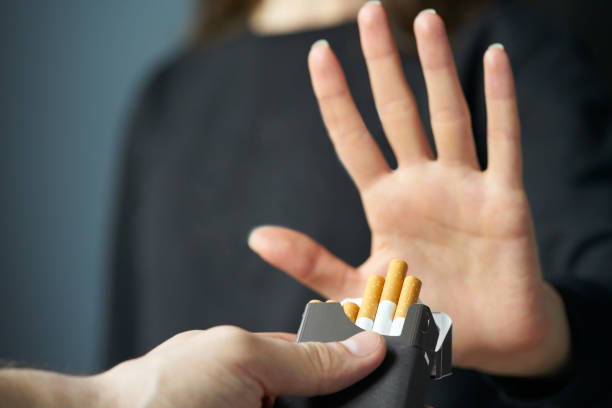 quitting smoking concept. hand is refusing cigarette offer - quitting imagens e fotografias de stock
