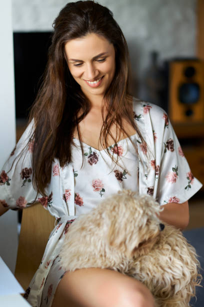 istock beautiful woman holding on her lap and working remotely 1237980984