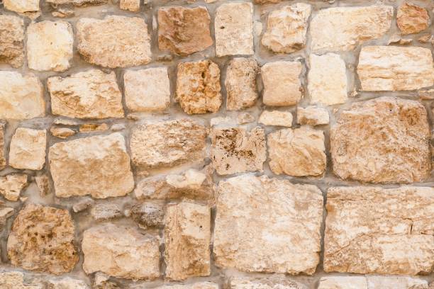 istock Stone wall texture. Old cobble stoned background. Details. Jerusalem, Israel 1237980989