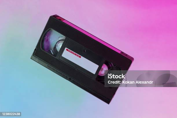 Video Tape On Background Vhs Video Tape Stock Photo - Download Image Now - Videocassette, 1980, VCR