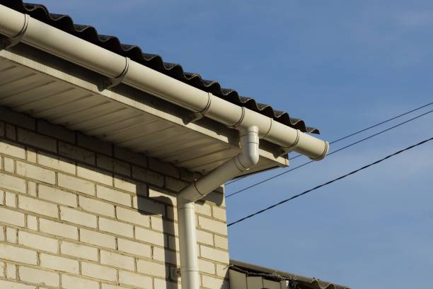 istock plastic white gutter pipes on the wall of the house 1238038238