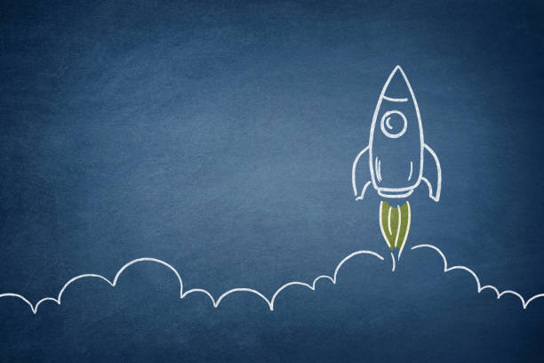 istock Business Startup Concept with Spaceship on Blackboard 1238069913