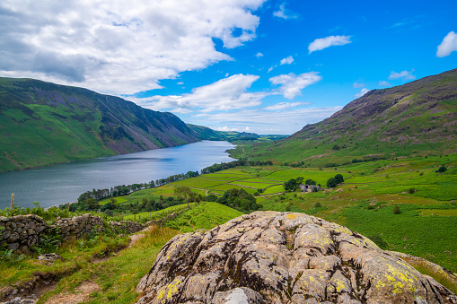 View down the length of Wast Water looking  towards Ravenglass from the path to the summit of Yewbarrow mountain, Lake District National Park, Cumbria, England.