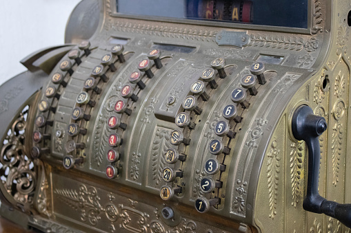 close up on old cash register, vintage decoration
