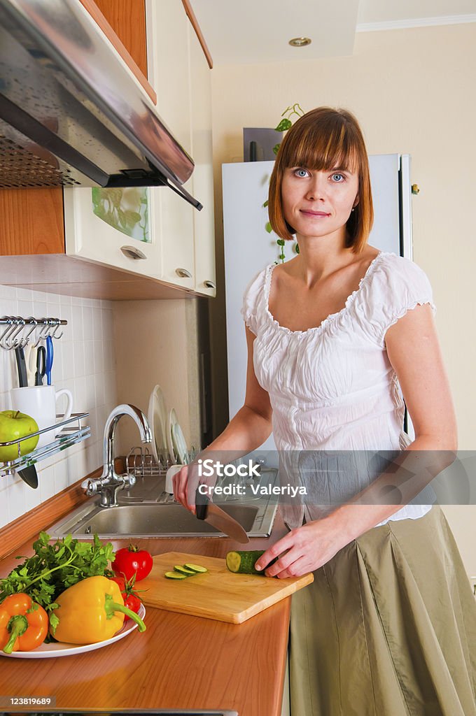 woman preparing something to eat  Adult Stock Photo