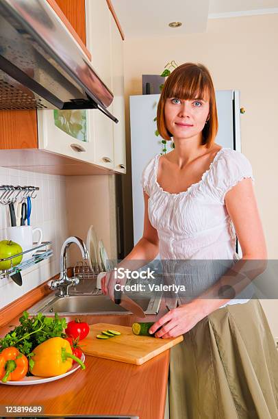 Woman Preparing Something To Eat Stock Photo - Download Image Now - Adult, Adults Only, Bell Pepper