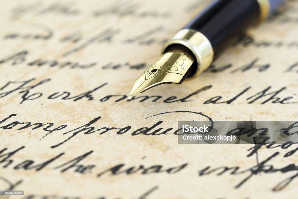 Old letter Close up of fountain pen on old letter Fountain Pen Stock Photo