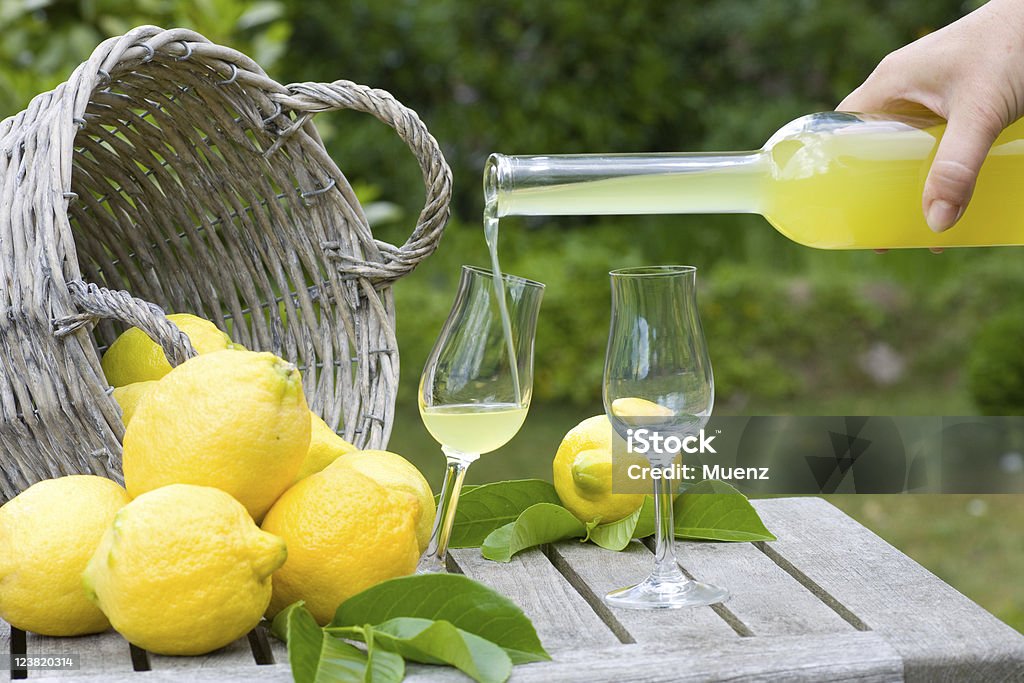 Limoncello and lemons  Alcohol - Drink Stock Photo