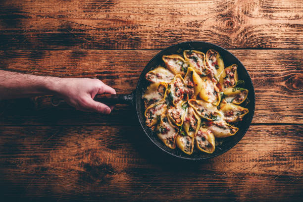 istock Skillet of stuffed jumbo shells pasta 1238207121