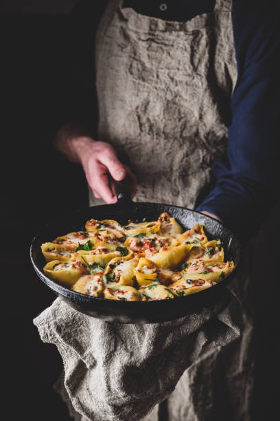 istock Skillet of pasta stuffed with ground beef, spinach and cheese 1238208142