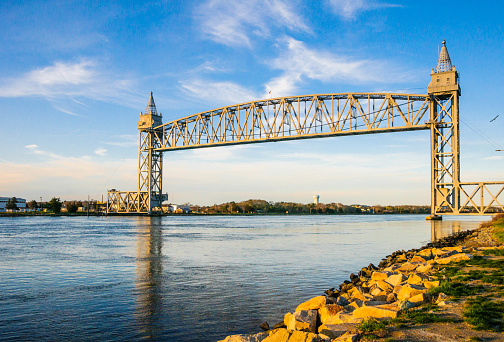 Built in 1935, the Cape Cod Canal railroad bridge is a vertical lift bridge located in Bourne Massachusetts.