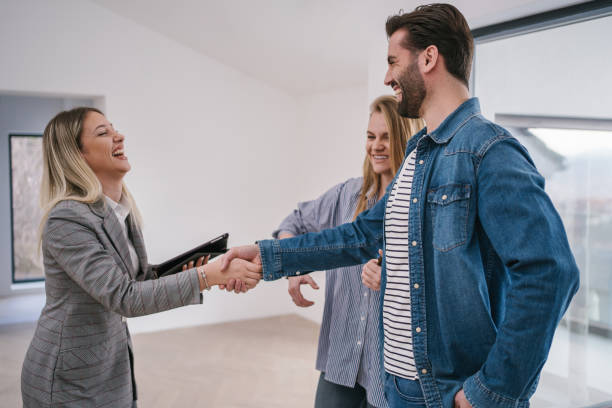 istock Cheerful husband making a big estate investment 1238256272