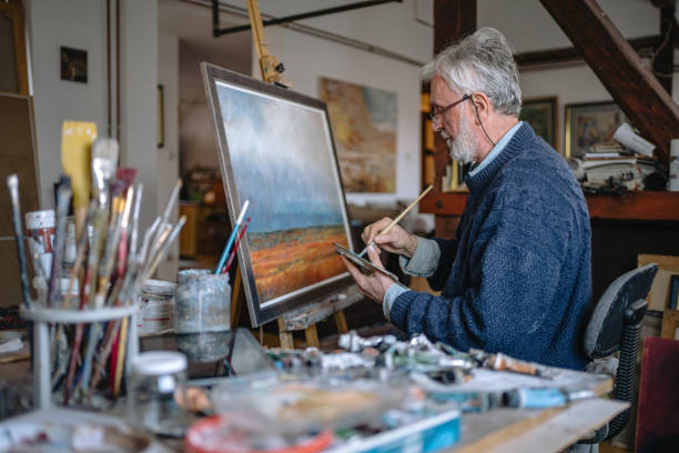 istock Art major senior man painting 1238256844