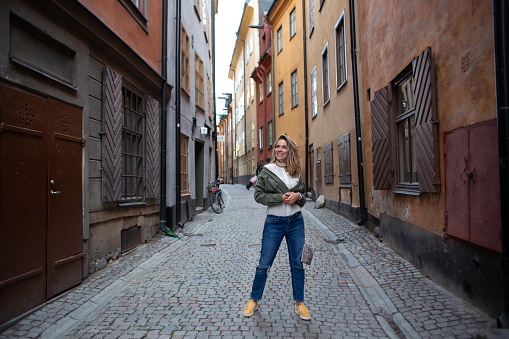 Young woman exploring Stockholm streets