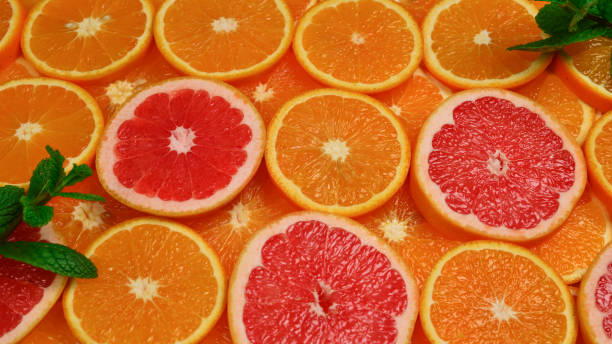 istock Slices of oranges and a grapefruits and mint 1238263854