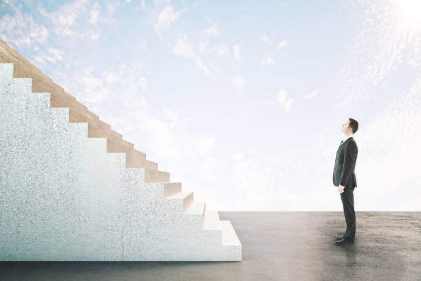 istock Businessman looking on abstract stairs 1238321109