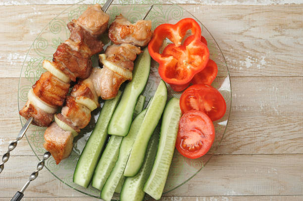 istock cooked pork skewer on skewers - with onions 1238374790