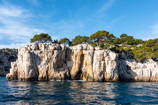The imposing limestone cliffs overlooking the Mediterranean Sea at the Parc national des Calanques near Cassis, France