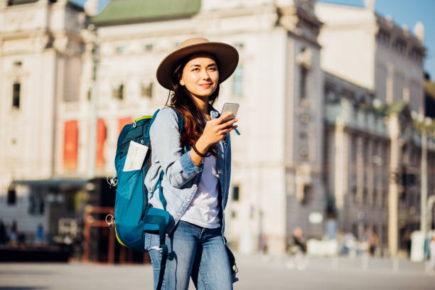 istock Young woman carrying a backpack 1238588220