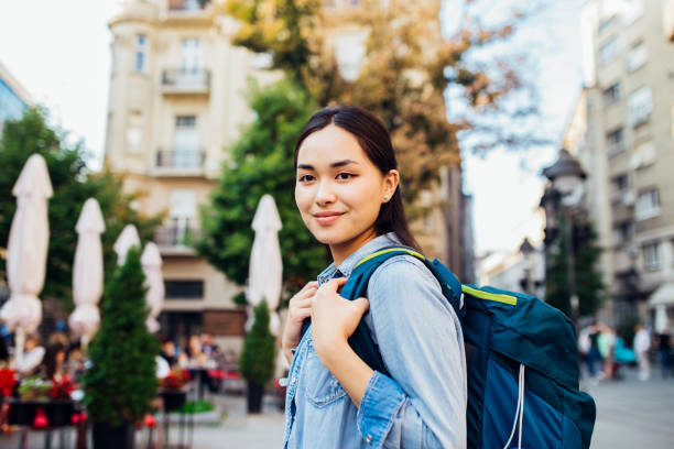 istock Interesting girl looking at the photo camera 1238588223