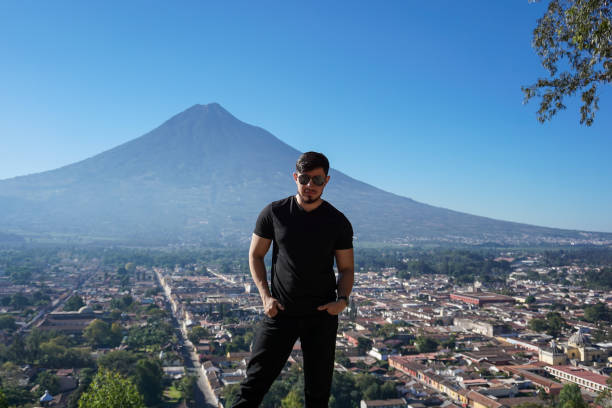 istock Incredible landscape of a man with a volcano 1238617454