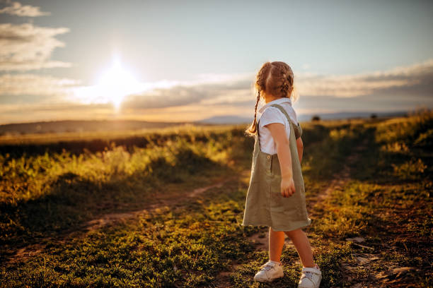 istock Kid walking in strawberry field 1238633777