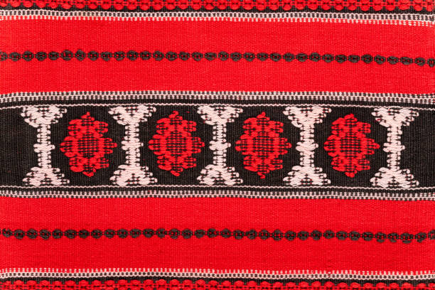 Chiprovtsi Carpets (rugs). Traditional colorful carpets from Chiprovtsi region in Bulgaria. Hand-woven (hand-made) carpets with different elements and colours. Ethnic and folk patterns. Red.