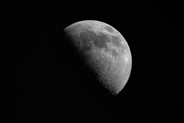 istock Close-up of the half moon at night (first quarter moon) 1238666648