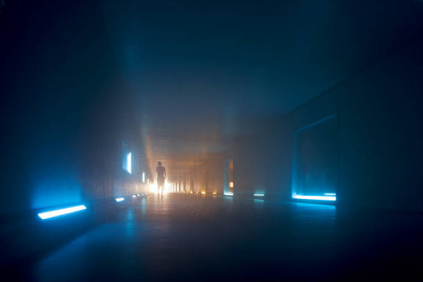 istock Woman walking in dark tunnel 1238682539