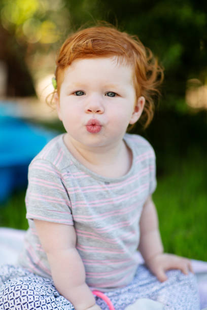 istock Gorgeous cute red haired little girl 1238707203